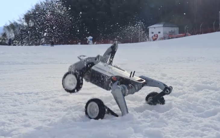 Посмотрите, как китайский робопес танцует в снегу Посмотрите, как китайский робопес танцует в снегу