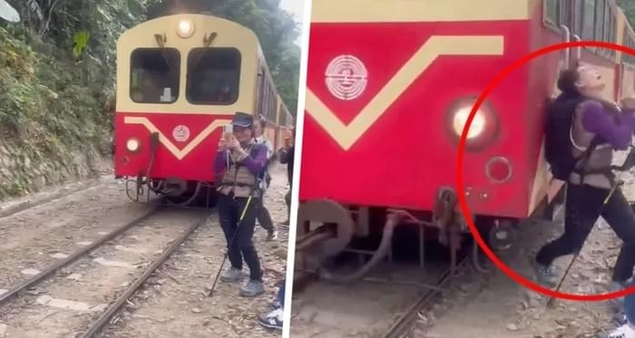 Шокирующий момент: беспечная туристка попала под поезд, когда делала селфи рядом с рельсами на глазах у кричащих зрителей Шокирующий момент: беспечная туристка попала под поезд, когда делала селфи рядом с рельсами на глазах у кричащих зрителей